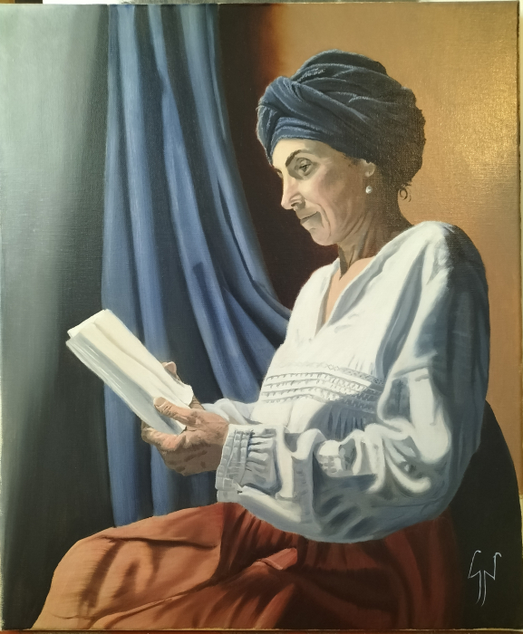 Liseuse à la fenêtre